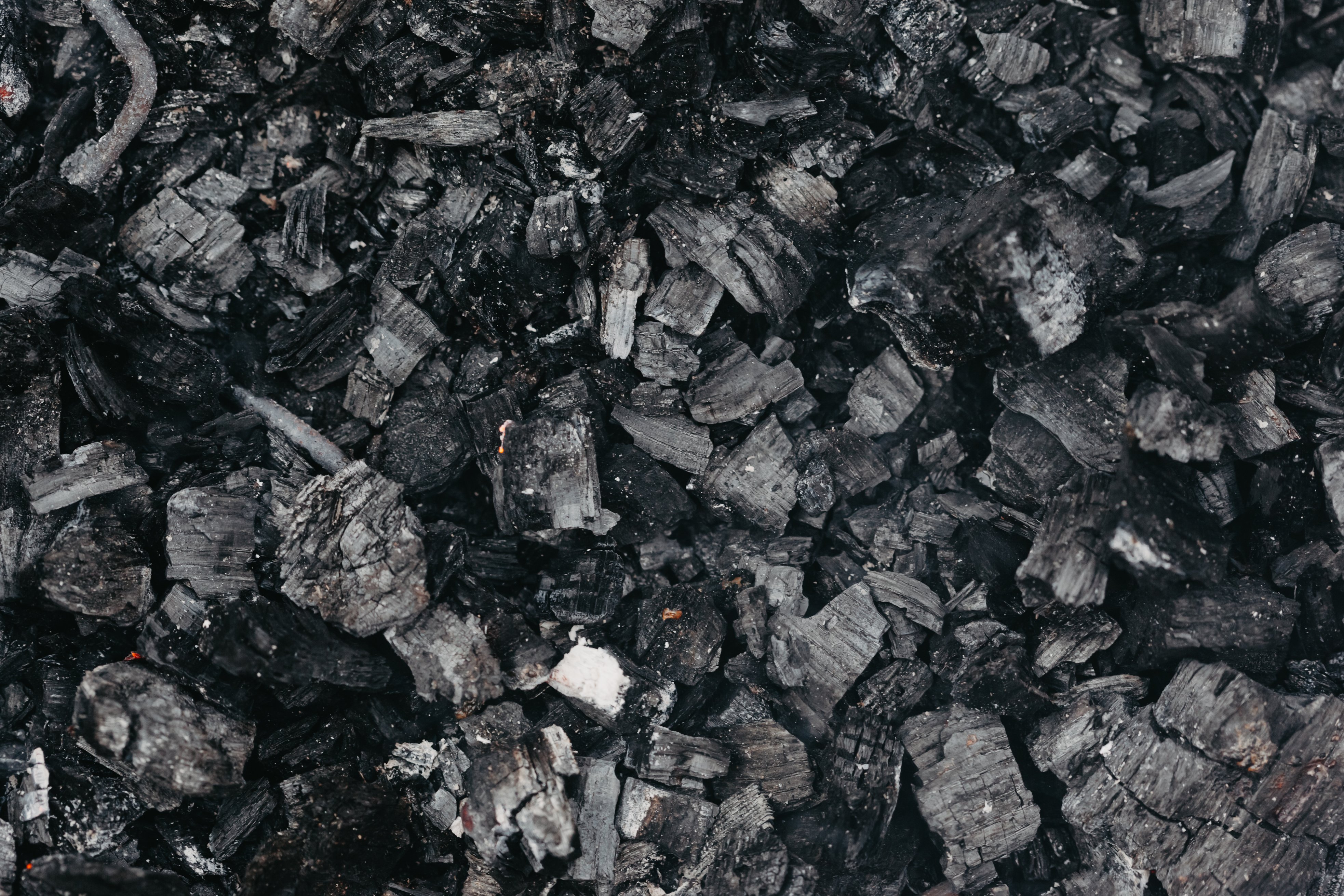 Backdrop of burnt coal with rugged surface